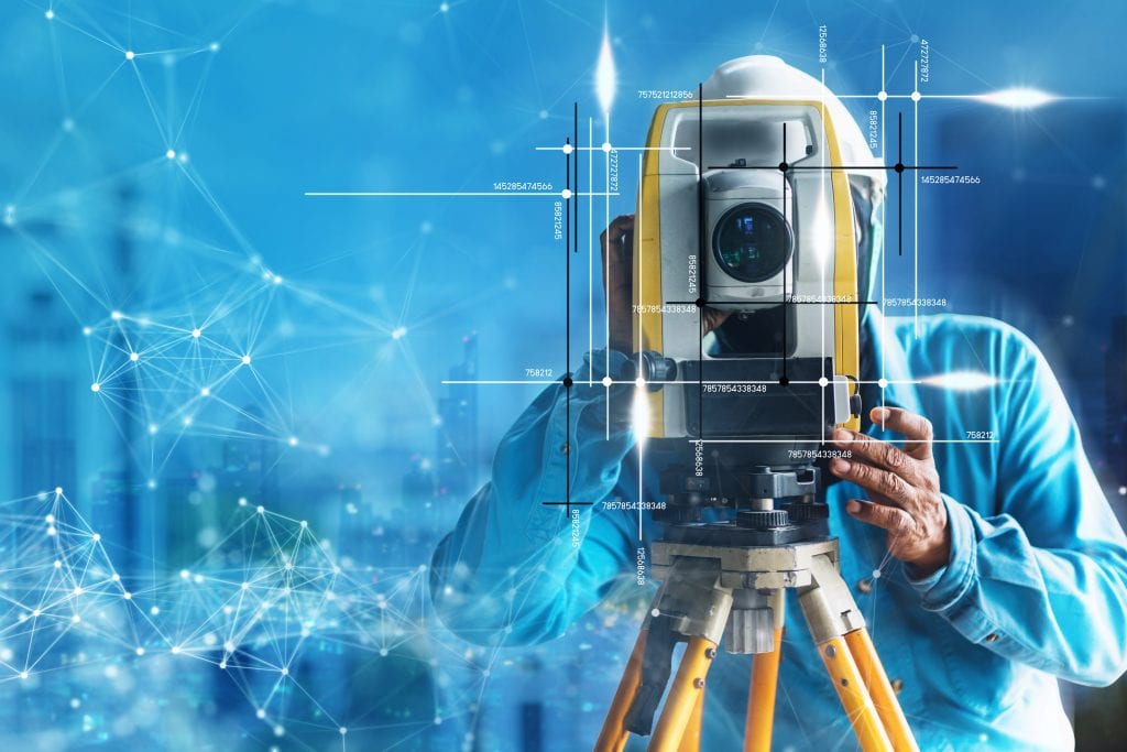 Man operating survey equipment